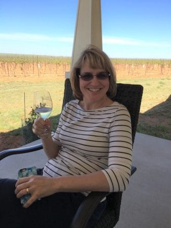 Laurie Ware enjoying a white wine (huh?) on the Day’s side porch