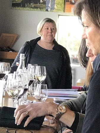 Kuhlman Cellars Marketing Director Jennifer Beckmann leading a Vina Vita University class on wine faults, flaws, and imbalances
