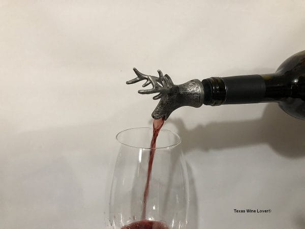 Buck wine pourer in action