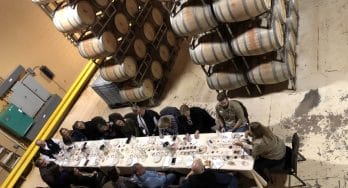 Tasting group in the barrel room