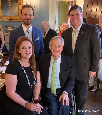 Rebecca Conley, Travis Conley, and John Hisaw with Governor Greg Abbott