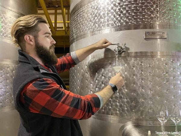 Alex Lee and tasting from the stainless tank